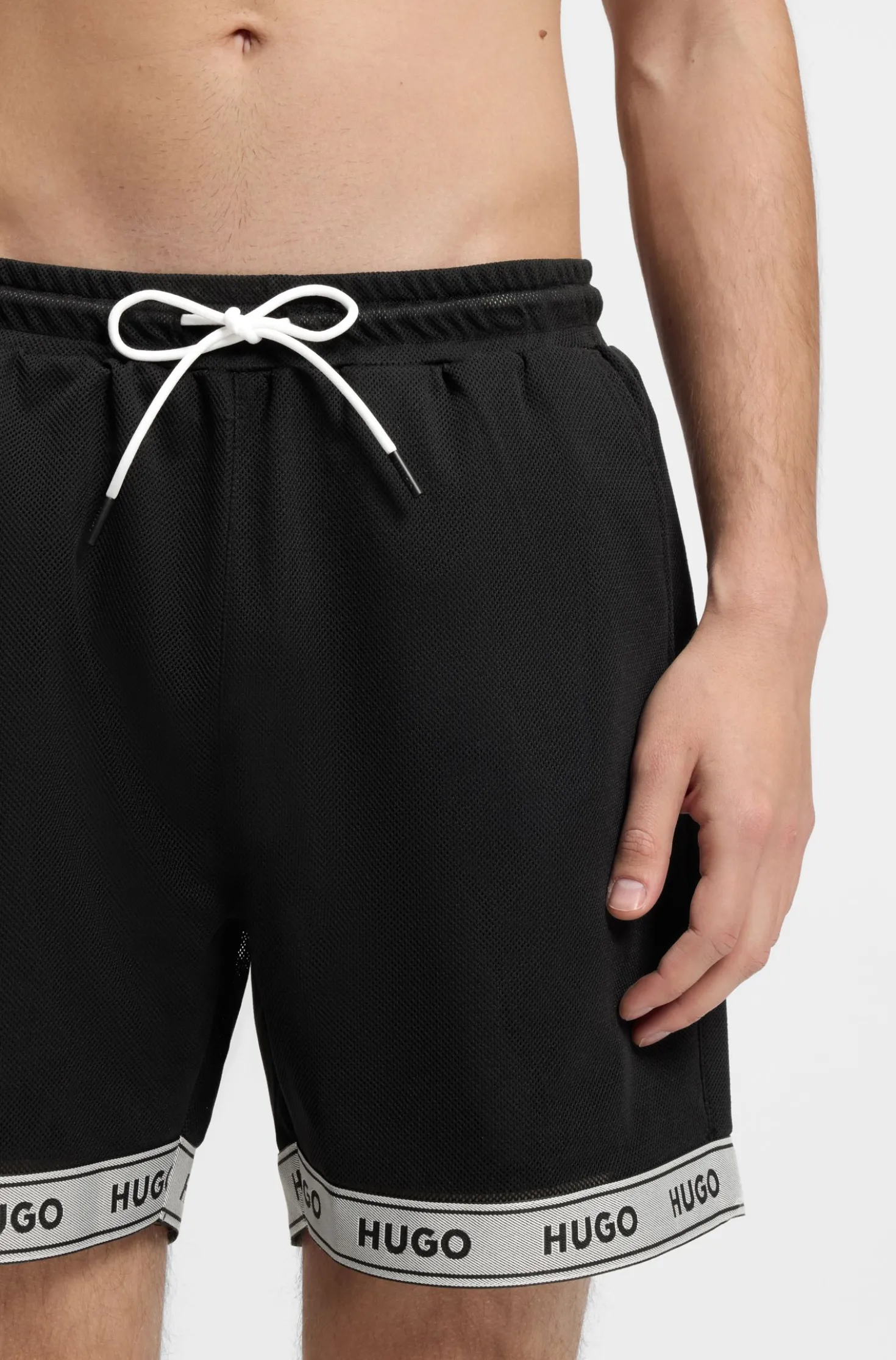 Badeshorts aus Mesh mit Jacquard-Logo-Tape