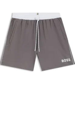 Badeshorts mit kontrastfarbenem Logo und Paspelierung
