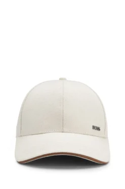 Cap aus Baumwoll-Canvas mit Lederbesatz