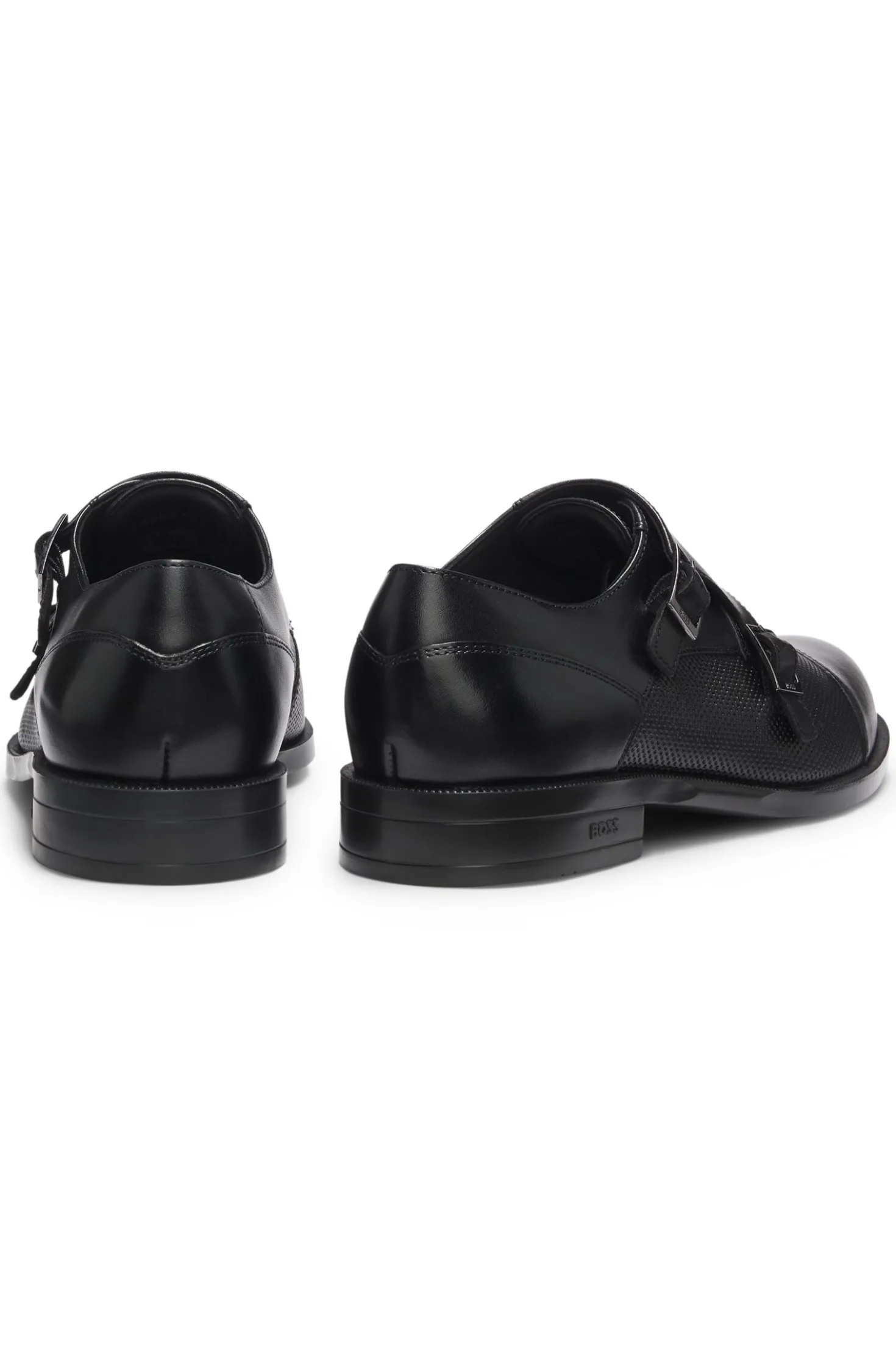 Doppelte Monkstraps aus Leder mit perforiertem Detail