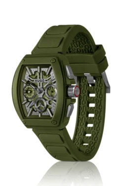 Grüne Uhr mit skelettiertem Zifferblatt und Silikonarmband