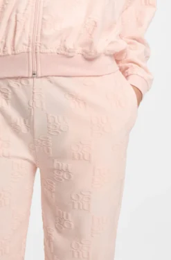 Jogginghose aus Baumwoll-Mix mit Allover-Logo-Muster