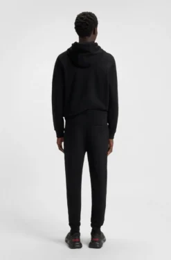 Jogginghose aus Baumwoll-Terry mit rotem Logo-Label