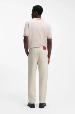 Relaxed Tapered-Fit Jeans aus Denim in Ecru