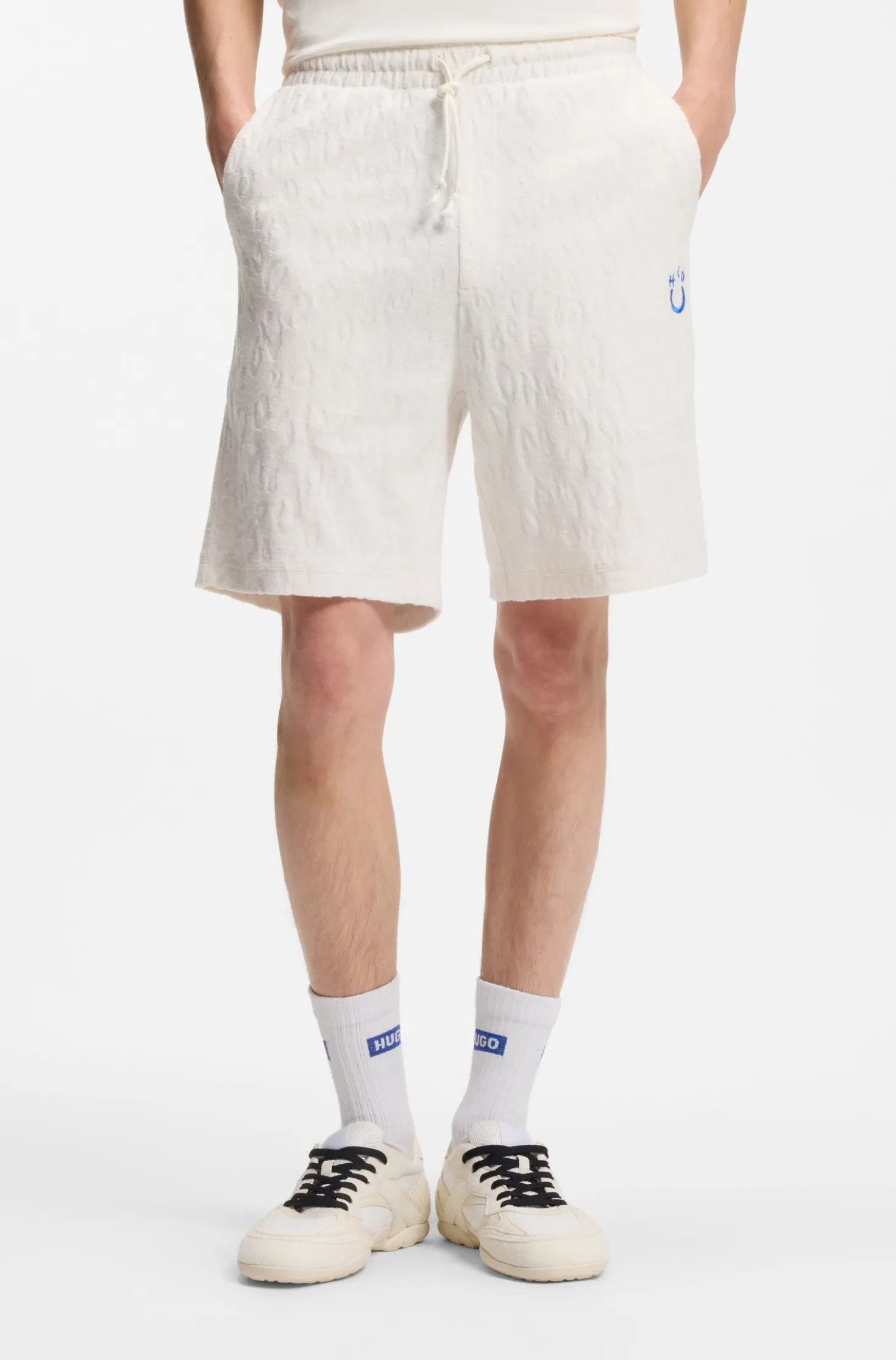 Shorts aus Baumwoll-Frottee mit Leopard-Jacquard