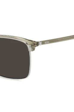 Sonnenbrille mit Titanbügeln und lasergravierten Logos