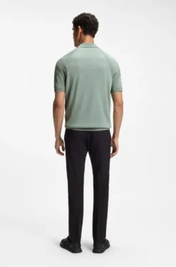 Strick-Poloshirt mit Reißverschluss am Kragen und Body-Mapping-Design