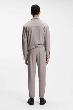 Tapered-Fit Hose aus Stretch-Gewebe mit Waffelstruktur