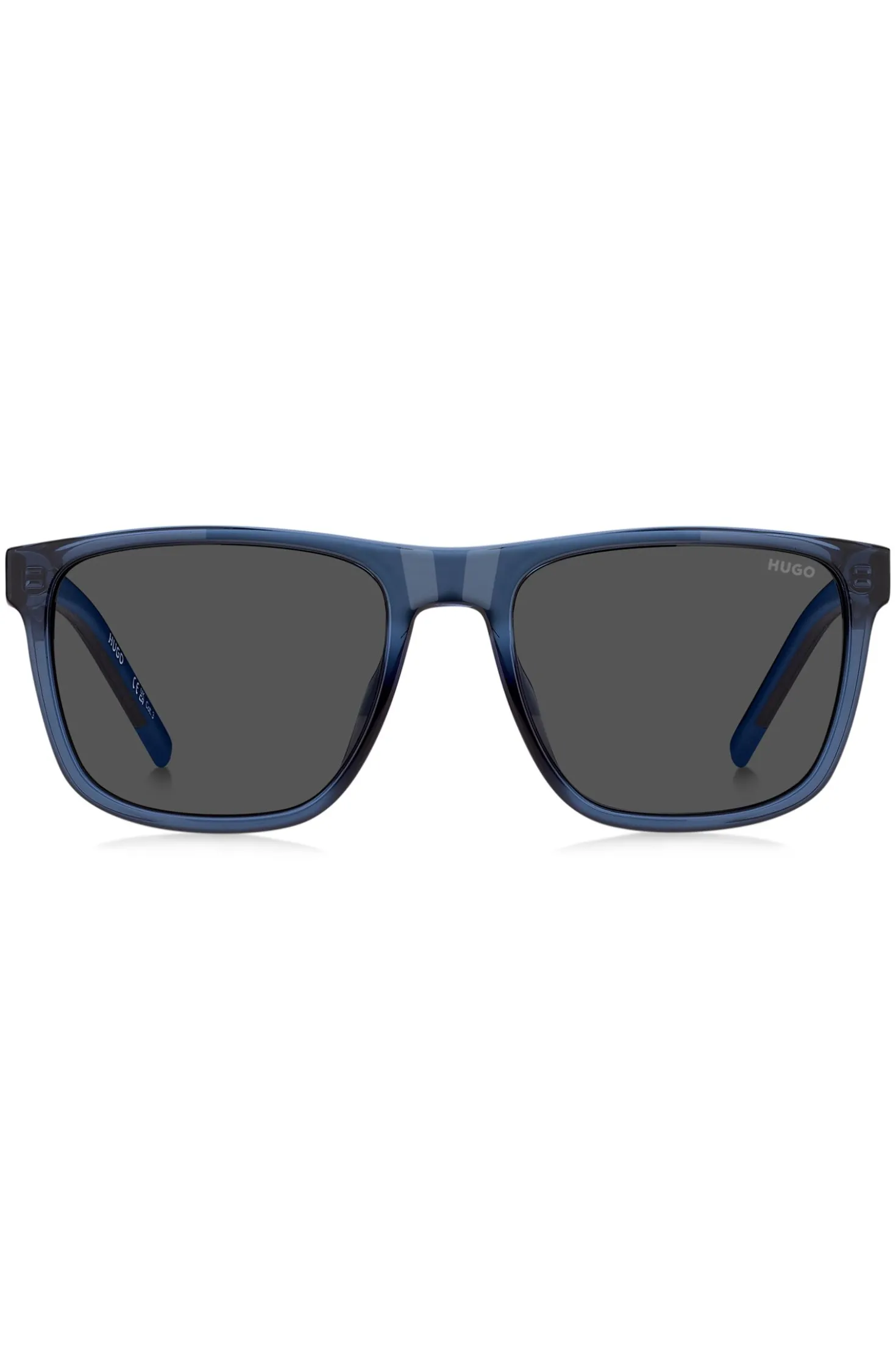 Transparent-blaue Sonnenbrille mit gemusterten Bügeln