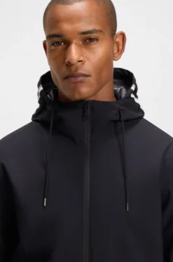 Wasserdichte Reitsport-Jacke mit verstellbarer Kapuze