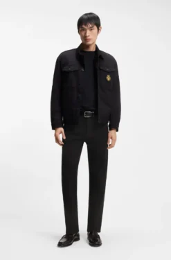 Year of the Horse Tapered-Fit Jeans aus schwarzem Denim mit gelasertem Muster